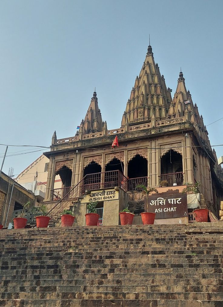 Morning view of Assi Ghat with devotees and boats